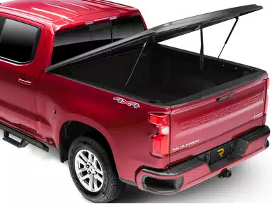 One-piece hinged tonneau cover